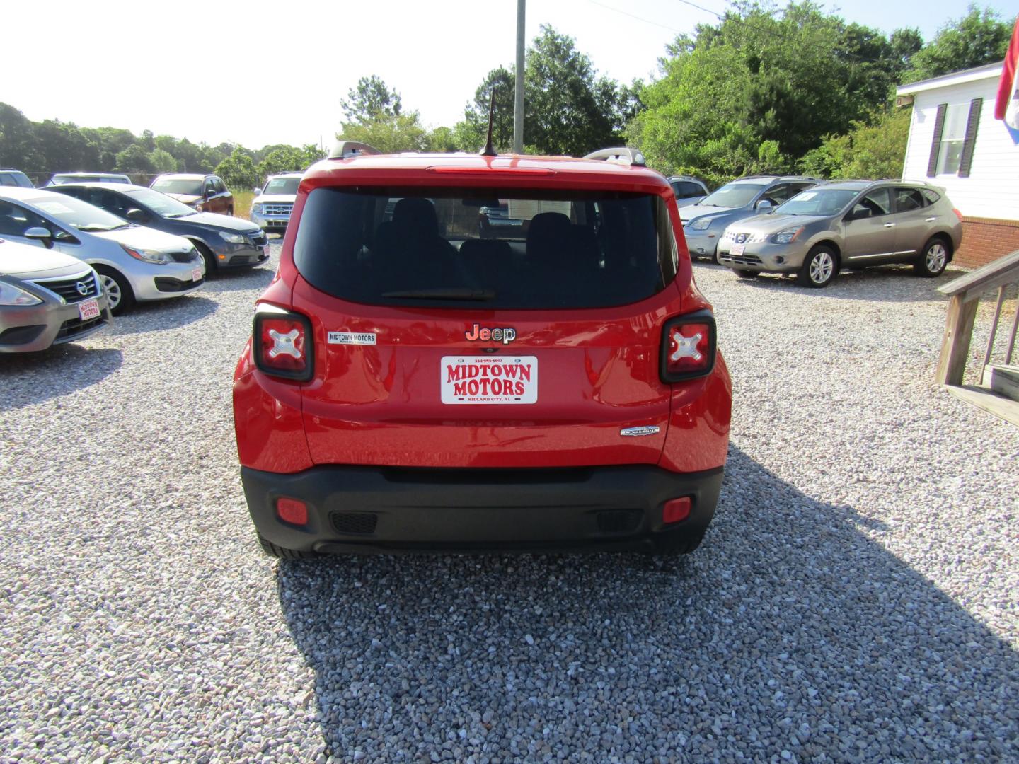 2016 Red /Gray Jeep Renegade Latitude FWD (ZACCJABT0GP) with an 2.4L L4 DOHC 16V engine, Automatic transmission, located at 15016 S Hwy 231, Midland City, AL, 36350, (334) 983-3001, 31.306210, -85.495277 - Photo#7